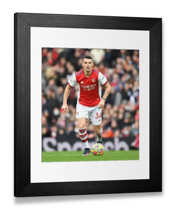 Framed Print : Granit Xhaka: Arsenal's Midfield Mastermind in Action against Brentford, Premier League 2021-22