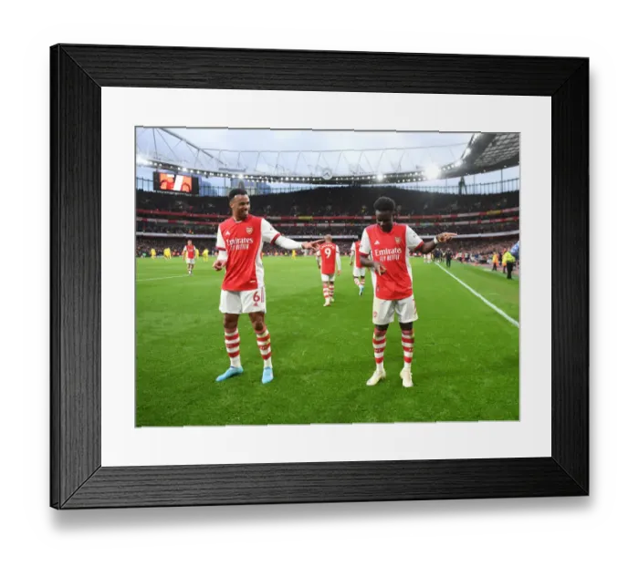 Framed Print : Arsenal's Saka and Gabriel Celebrate Second Goal Against Brentford (2021-22) Framed Print : Arsenal's Saka and Gabriel Celebrate Second Goal Against Brentford (2021-22)