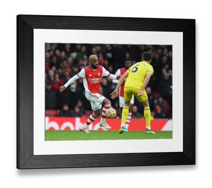 Framed Print : Arsenal's Alex Lacazette in Action Against Brentford, Premier League 2021-22 Framed Print : Arsenal's Alex Lacazette in Action Against Brentford, Premier League 2021-22