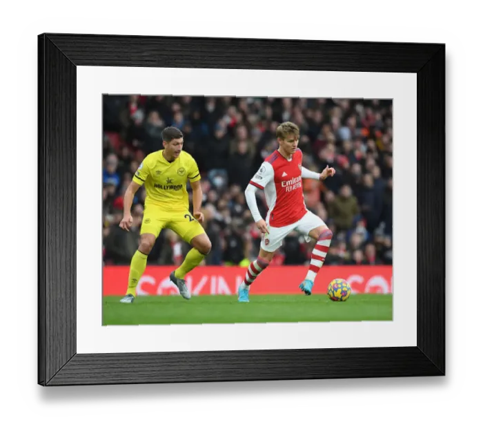 Framed Print : Arsenal's Martin Odegaard Shines in Arsenal vs. Brentford Premier League Clash