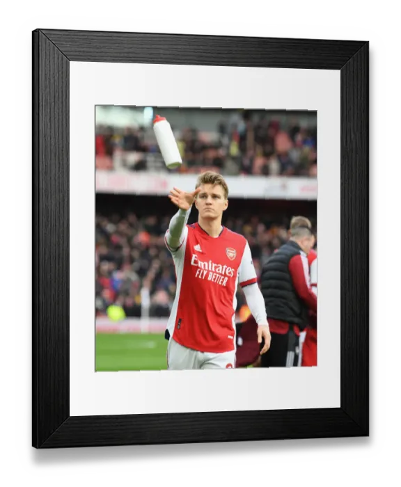 Framed Print : Martin Odegaard Shines: Arsenal's Triumph Over Brentford in the Premier League Framed Print : Martin Odegaard Shines: Arsenal's Triumph Over Brentford in the Premier League