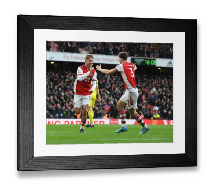 Framed Print : Smith Rowe and Tierney: Arsenal's Celebratory Moment as They Score First Goal Against Brentford (2021-22 Premier League)
