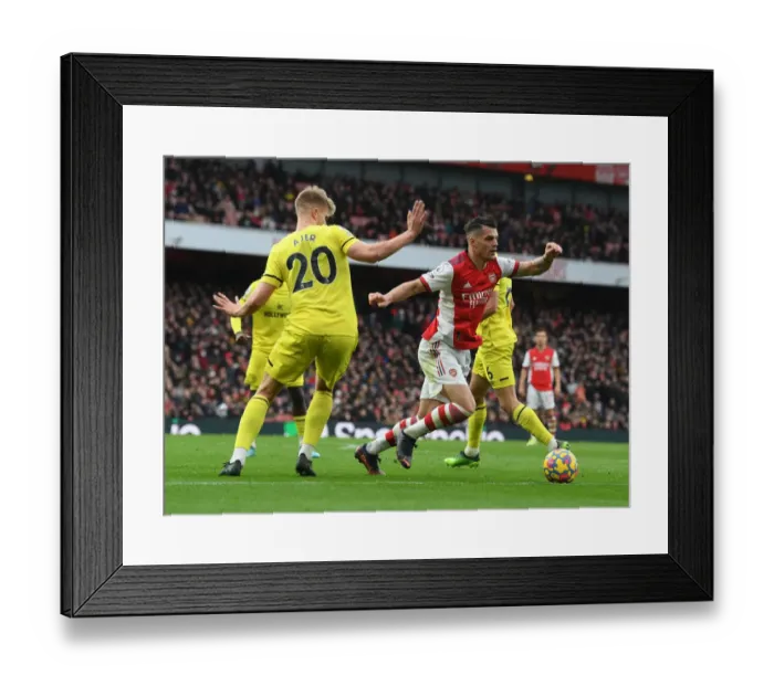 Framed Print : Granit Xhaka's Standout Performance: Arsenal's Triumph over Brentford (Premier League 2021-22) Framed Print : Granit Xhaka's Standout Performance: Arsenal's Triumph over Brentford (Premier League 2021-22)