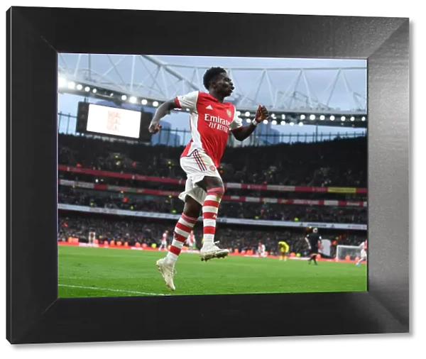 Bukayo Saka Scores His Second Goal: Arsenal's Victory over Brentford in the 2021-22 Premier League