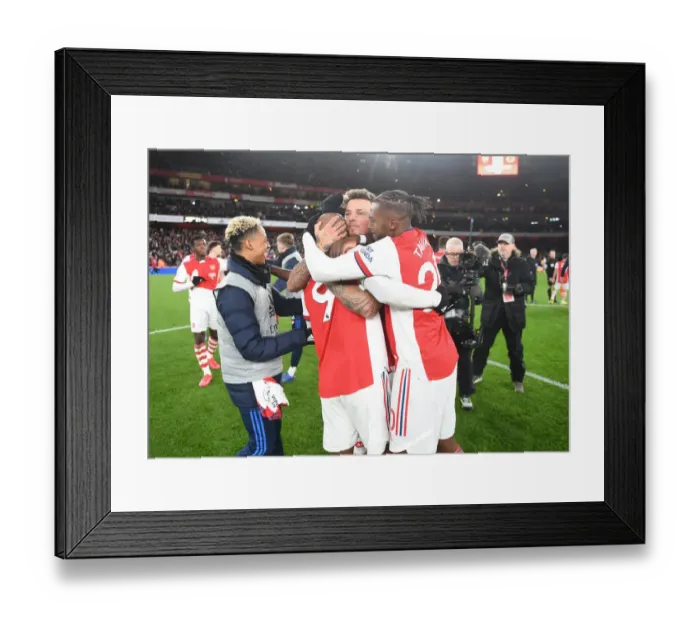 Framed Print : Arsenal Celebrate Lacazette's Goal: Arsenal vs. Wolverhampton Wanderers, Premier League 2021-22