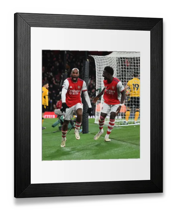 Framed Print : Arsenal's Lacazette and Saka Celebrate Goals Against Wolverhampton Wanderers in Premier League 2021-22 Framed Print : Arsenal's Lacazette and Saka Celebrate Goals Against Wolverhampton Wanderers in Premier League 2021-22