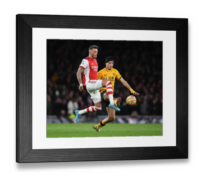 Framed Print : Arsenal's White Faces Off Against Jimenez: A Premier League Showdown Framed Print : Arsenal's White Faces Off Against Jimenez: A Premier League Showdown