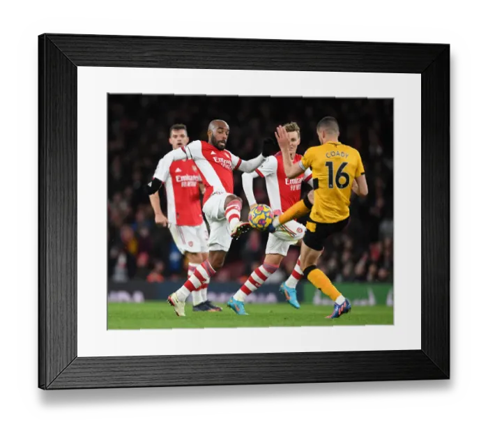 Framed Print : Lacazette vs. Coady: A Premier League Showdown at the Emirates
