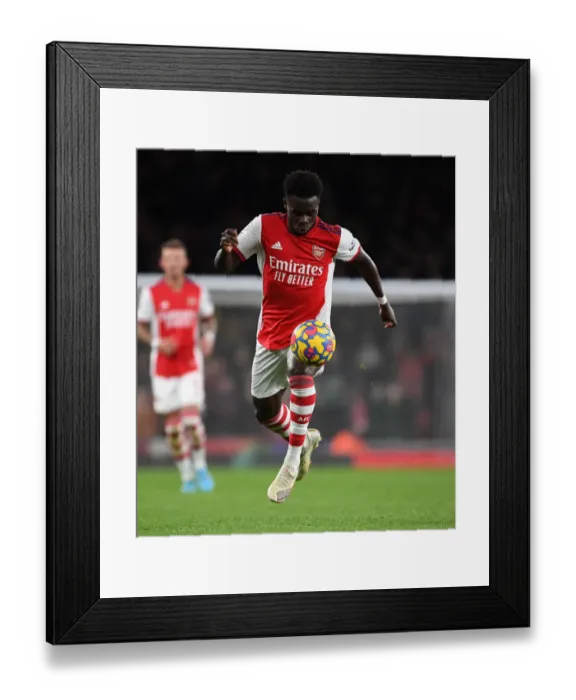 Framed Print : Arsenal's Bukayo Saka in Action: Arsenal vs. Wolverhampton Wanderers (2021-22) - Premier League Clash at Emirates Stadium Framed Print : Arsenal's Bukayo Saka in Action: Arsenal vs. Wolverhampton Wanderers (2021-22) - Premier League Clash at Emirates Stadium