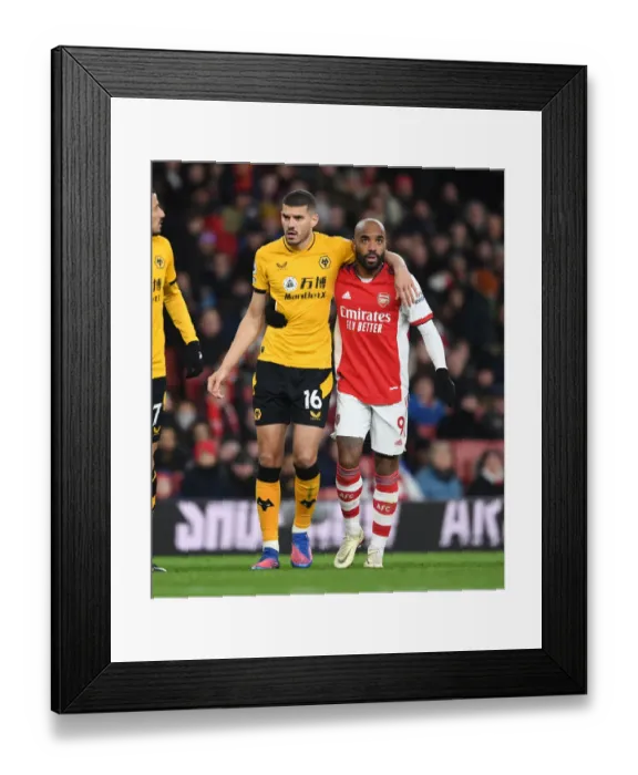 Framed Print : Lacazette vs. Coady: A Premier League Showdown at the Emirates