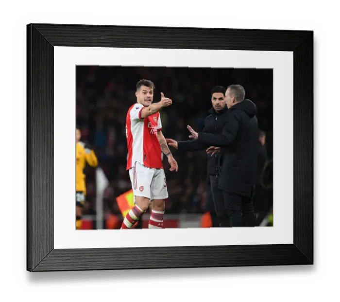 Framed Print : Arsenal's Xhaka Protests to Referee during Arsenal vs. Wolverhampton Wanderers (2021-22) Framed Print : Arsenal's Xhaka Protests to Referee during Arsenal vs. Wolverhampton Wanderers (2021-22)