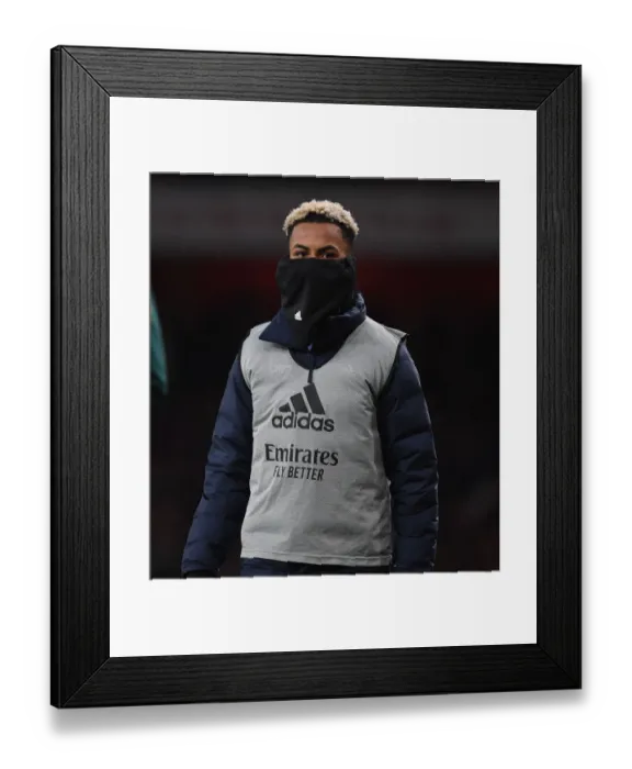 Framed Print : Arsenal's Omari Hutchinson in Action Against Wolverhampton Wanderers, Premier League 2021-22