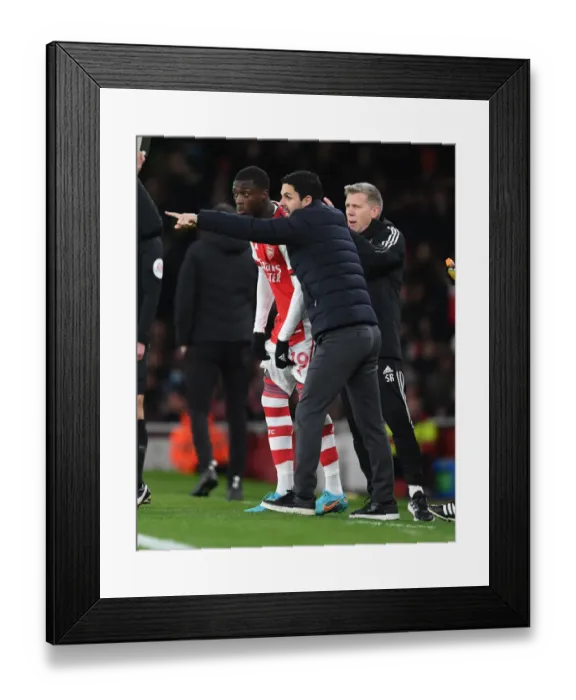 Framed Print : Arsenal Manager Mikel Arteta with Nicolas Pepe: Arsenal vs. Wolverhampton Wanderers, Premier League 2021-22