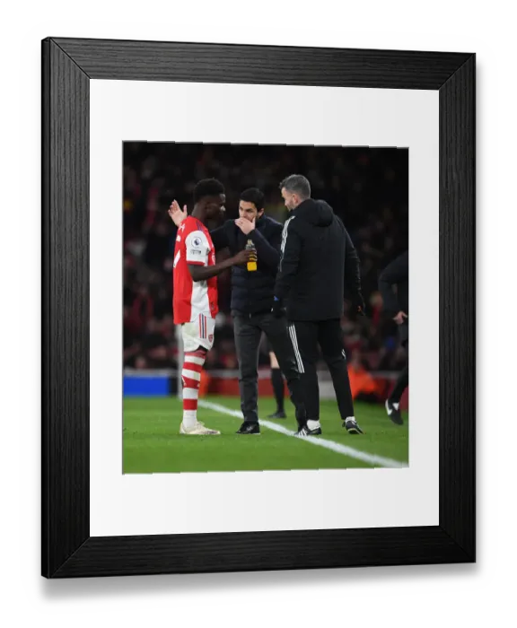 Framed Print : Arsenal Manager Mikel Arteta Guides Bukayo Saka during Arsenal vs. Wolverhampton Wanderers, Premier League 2021-22 Framed Print : Arsenal Manager Mikel Arteta Guides Bukayo Saka during Arsenal vs. Wolverhampton Wanderers, Premier League 2021-22