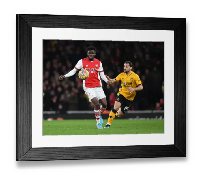 Framed Print : Partey vs. Jonny: A Battle of Midfielders in Arsenal vs. Wolverhampton Wanderers Premier League Clash