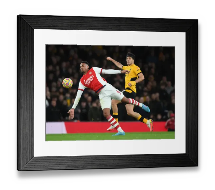 Framed Print : Gabriel's Sneaky Move: Arsenal's Defender Outwits Raul Jimenez in Premier League Clash Framed Print : Gabriel's Sneaky Move: Arsenal's Defender Outwits Raul Jimenez in Premier League Clash