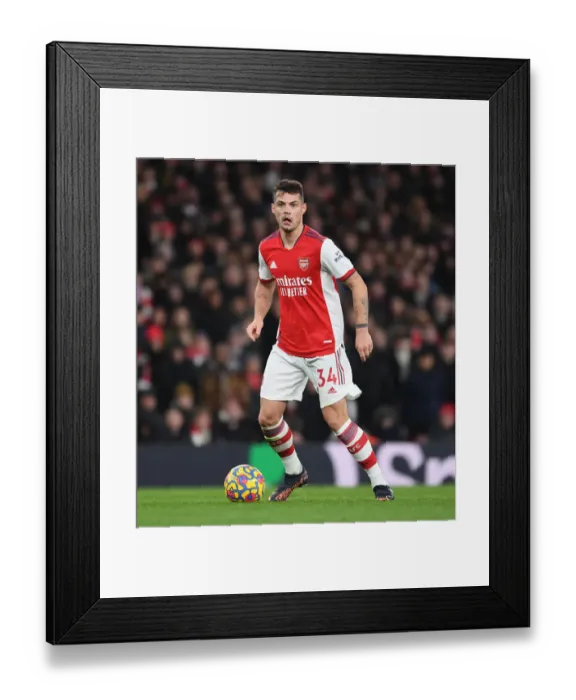 Framed Print : Granit Xhaka: Arsenal's Midfield Maestro in Action against Wolverhampton Wanderers, Premier League 2021-22