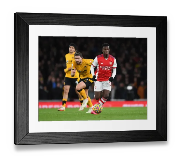 Framed Print : Arsenal's Eddie Nketiah Outmaneuvers Wolves Ruben Neves in Premier League Clash Framed Print : Arsenal's Eddie Nketiah Outmaneuvers Wolves Ruben Neves in Premier League Clash