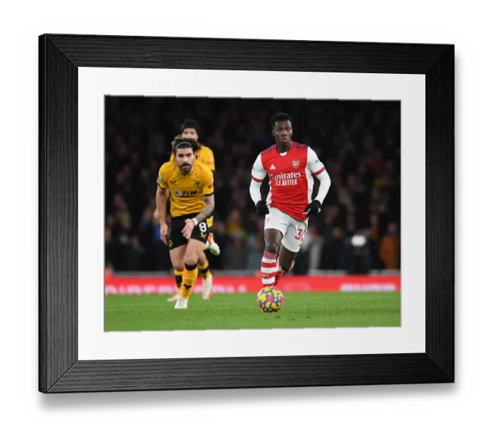 Framed Print : Nketiah Outsmarts Neves: Arsenal's Masterclass Performance Against Wolves