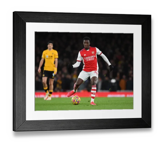 Framed Print : Arsenal's Eddie Nketiah in Action Against Wolverhampton Wanderers - Premier League 2021-22 Framed Print : Arsenal's Eddie Nketiah in Action Against Wolverhampton Wanderers - Premier League 2021-22