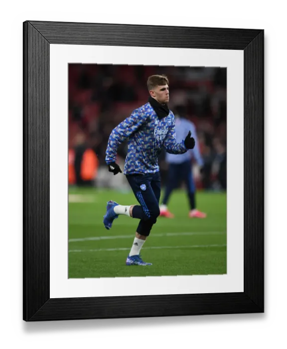 Framed Print : Arsenal Players Pre-Match Warm-Up: Arsenal vs. Wolverhampton Wanderers at Emirates Stadium (2021-22)