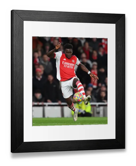 Framed Print : Arsenal's Bukayo Saka in Action: Arsenal vs. Wolverhampton Wanderers, Premier League 2021-22