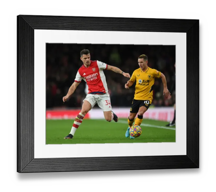 Framed Print : Intense Battle: Xhaka vs. Podence - Arsenal vs. Wolverhampton Wanderers Framed Print : Intense Battle: Xhaka vs. Podence - Arsenal vs. Wolverhampton Wanderers