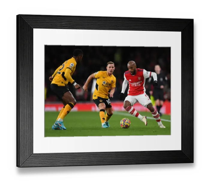 Framed Print : Lacazette vs. Podence: A Premier League Showdown at the Emirates Framed Print : Lacazette vs. Podence: A Premier League Showdown at the Emirates