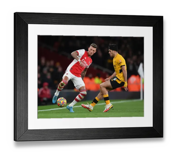 Framed Print : Intense Rivalry: Ben White vs. Raul Jimenez - Arsenal vs. Wolverhampton Wanderers: A Premier League Battle