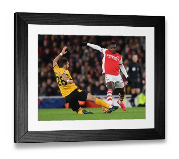 Framed Print : Nketiah vs. Moutinho: A Battle in the Arsenal vs. Wolverhampton Wanderers Premier League Clash
