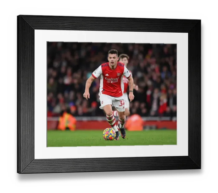 Framed Print : Granit Xhaka: Arsenal's Midfield Mastermind in Action against Wolverhampton Wanderers, Premier League 2021-22