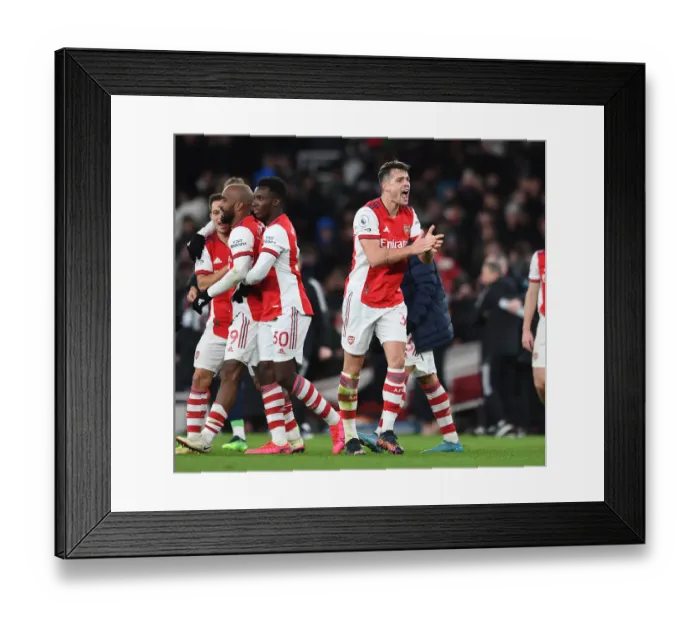 Framed Print : Xhaka's Euphoric Celebration: Arsenal Secures Premier League Victory over Wolverhampton Wanderers