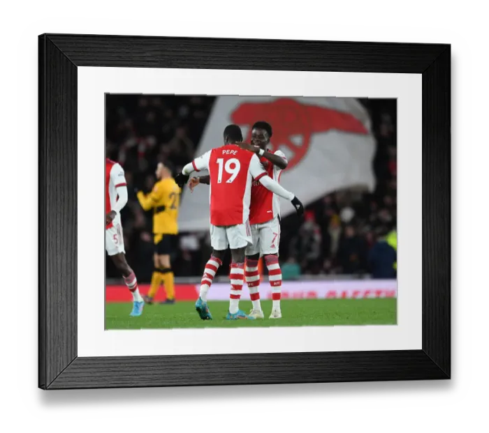 Framed Print : Arsenal's Bukayo Saka and Nicolas Pepe Celebrate Goal vs. Wolverhampton Wanderers (2021-22)