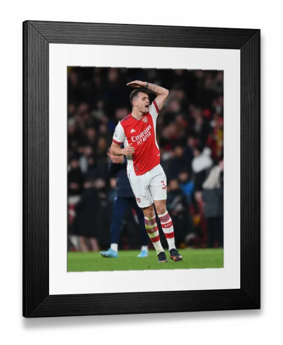Framed Print : Granit Xhaka's Triumphant Moment: Arsenal's Victory over Wolverhampton Wanderers