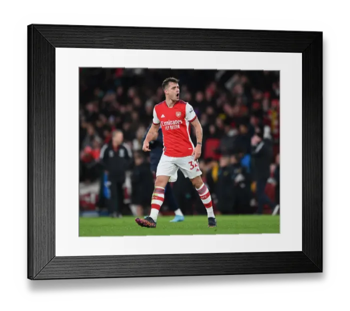 Framed Print : Granit Xhaka's Celebration: Arsenal Secures Victory Over Wolverhampton Wanderers in the Premier League
