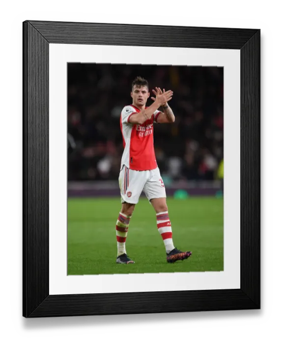 Framed Print : Arsenal's Granit Xhaka Celebrates with Fans after Arsenal vs. Wolverhampton Wanderers, Premier League 2021-22