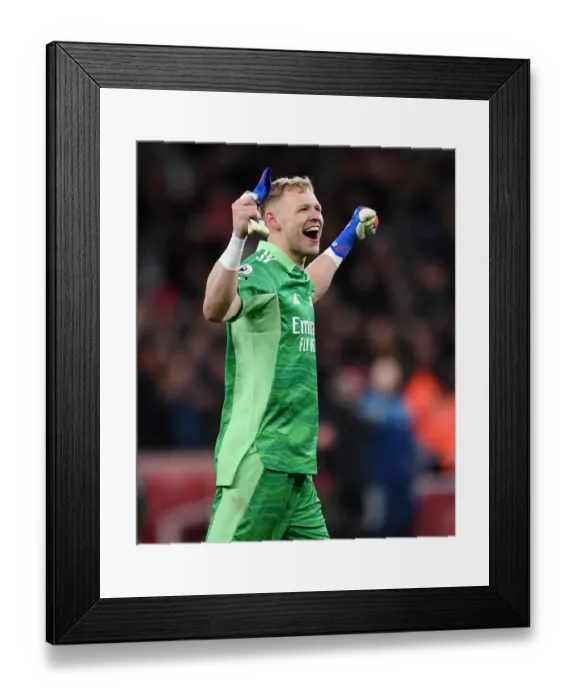 Framed Print : Arsenal Clinch Premier League Victory: Aaron Ramsdale's Emotional Celebration vs. Wolverhampton Wanderers (2021-22)