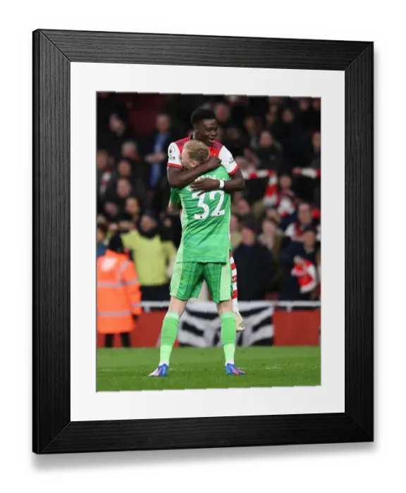 Framed Print : Arsenal's Bukayo Saka and Aaron Ramsdale Celebrate Goal vs. Wolverhampton Wanderers (Premier League 2021-22) Framed Print : Arsenal's Bukayo Saka and Aaron Ramsdale Celebrate Goal vs. Wolverhampton Wanderers (Premier League 2021-22)
