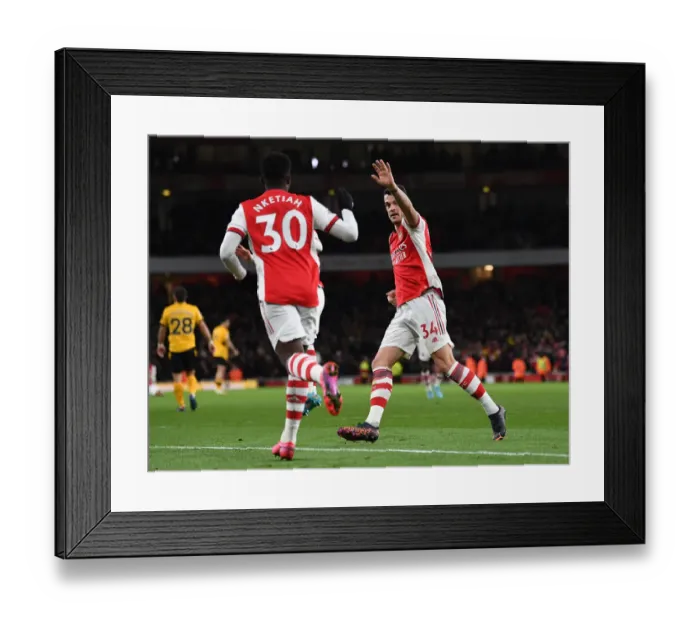 Framed Print : Arsenal's Xhaka and Nketiah Celebrate First Goal Against Wolverhampton Wanderers in 2021-22 Premier League