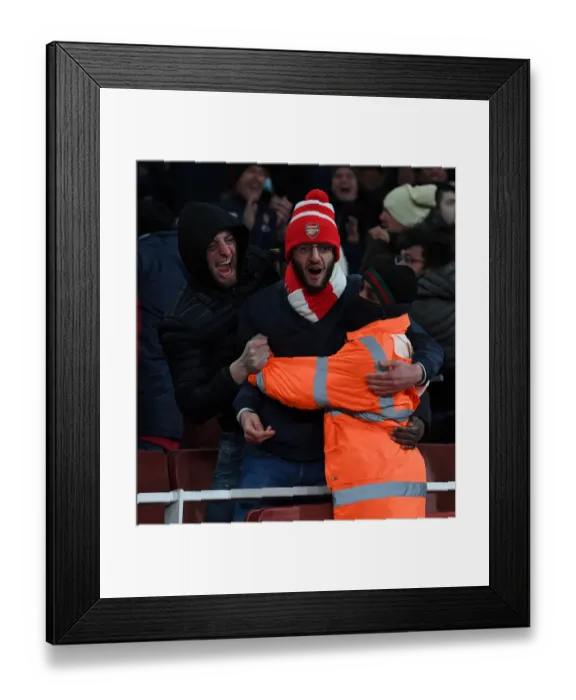 Framed Print : Arsenal Fans Euphoria: The Unforgettable Moment of the Second Goal vs. Wolverhampton Wanderers in the 2021-22 Premier League
