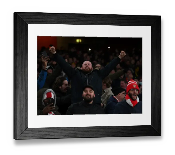 Framed Print : Arsenal Fans Euphoria: A Memorable Moment at Emirates Stadium - The Thrill of the Second Goal vs. Wolverhampton Wanderers in the Premier League 2021-22