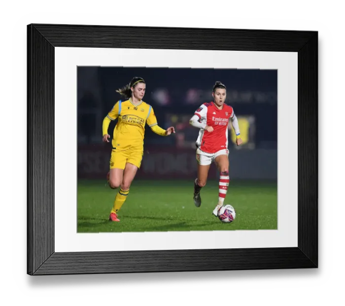 Framed Print : Steph Catley vs. Emma Harries: A Fierce Rivalry Unfolds in Arsenal Women vs. Reading Women FA WSL Match Framed Print : Steph Catley vs. Emma Harries: A Fierce Rivalry Unfolds in Arsenal Women vs. Reading Women FA WSL Match