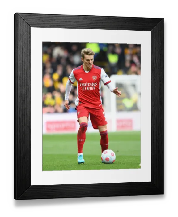 Framed Print : Arsenal's Martin Odegaard: Midfield Genius Shines in Premier League Clash Against Watford Framed Print : Arsenal's Martin Odegaard: Midfield Genius Shines in Premier League Clash Against Watford