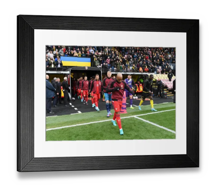 Framed Print : Arsenal Players Walk Out Ahead of Watford vs Arsenal Premier League Match (2021-22)