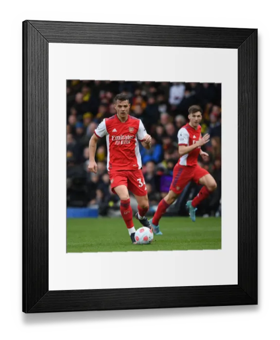 Framed Print : Granit Xhaka's Brilliant Midfield Performance: Arsenal Triumphs Over Watford in the Premier League 2021-22 Framed Print : Granit Xhaka's Brilliant Midfield Performance: Arsenal Triumphs Over Watford in the Premier League 2021-22