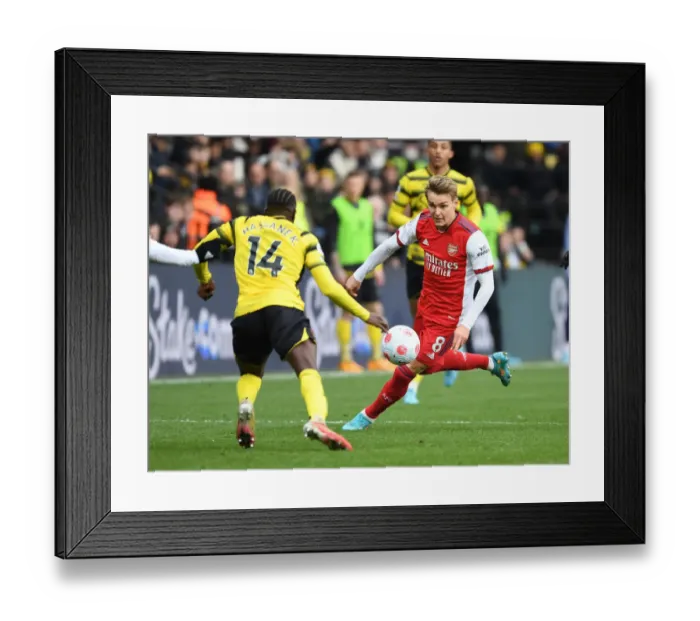Framed Print : Martin Odegaard Clashes with Hassane Kamara: Watford vs Arsenal, Premier League 2021-22 Framed Print : Martin Odegaard Clashes with Hassane Kamara: Watford vs Arsenal, Premier League 2021-22