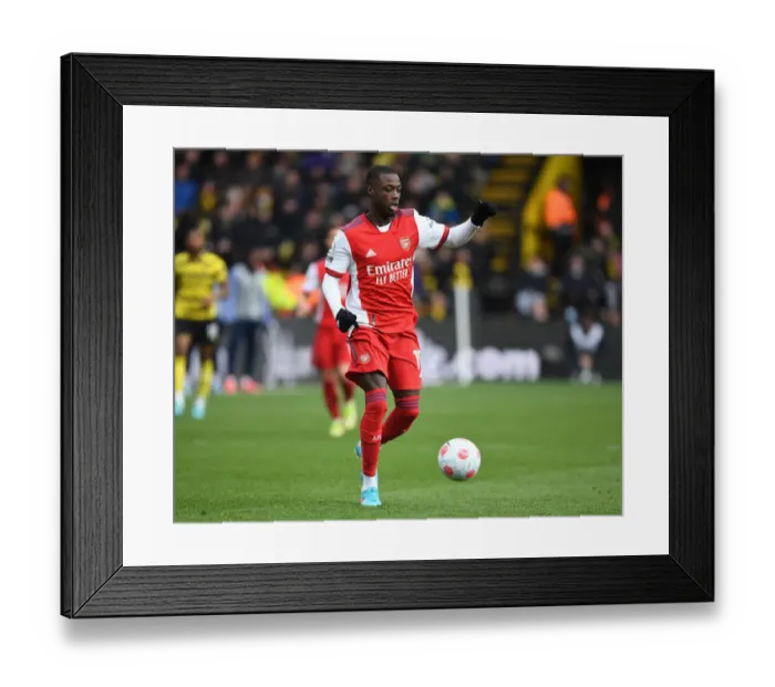 Framed Print : Arsenal's Nicolas Pepe in Action: Premier League Clash with Watford, 2021-22