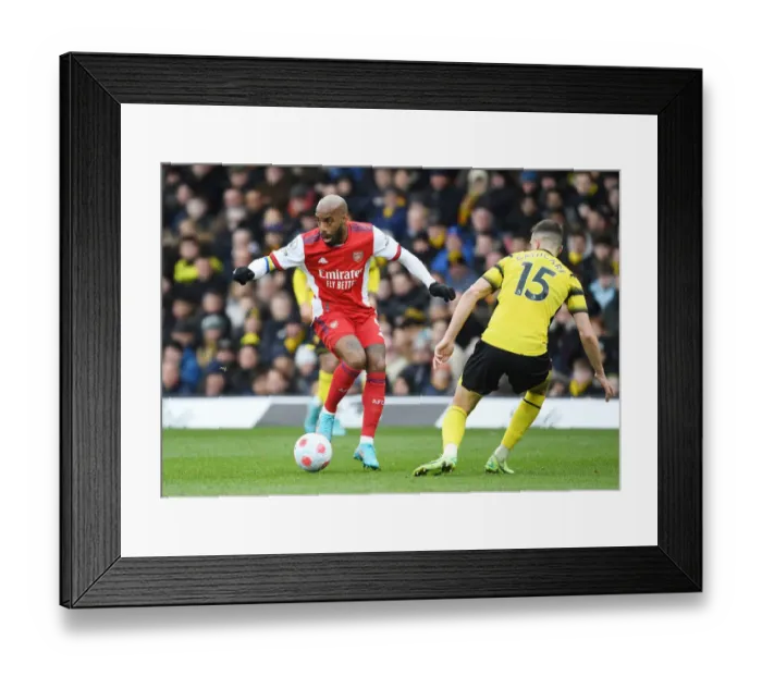 Framed Print : Arsenal's Lacazette Clashes with Watford's Cathcart in Premier League Showdown