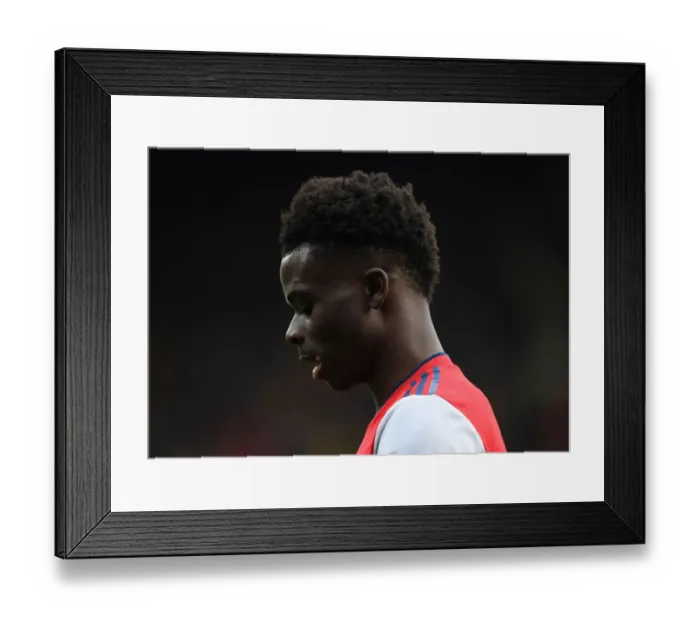 Framed Print : Bukayo Saka Shines: Arsenal's Triumph Over Watford in the Premier League 2021-22