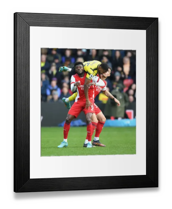Framed Print : Intense Rivalry: Partey and Xhaka Lock Horns with Emmanuel Dennis in Watford vs. Arsenal Framed Print : Intense Rivalry: Partey and Xhaka Lock Horns with Emmanuel Dennis in Watford vs. Arsenal